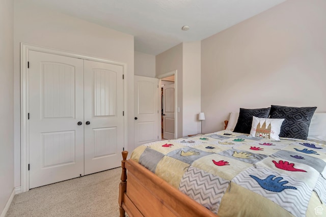 3028 W Viola Ln, Riverton, UT 84065 - bedroom with light colored carpet, a closet, and baseboards