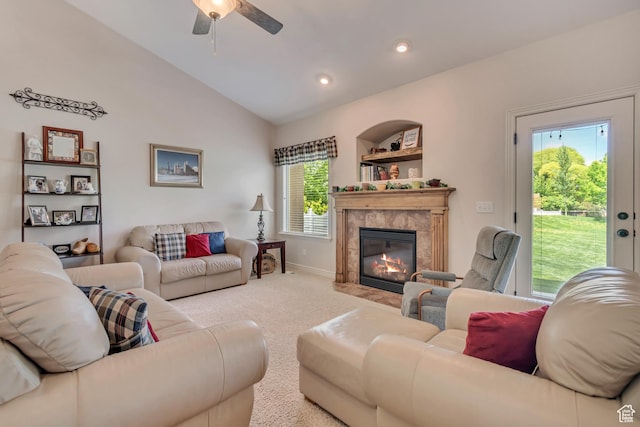 3028 W Viola Ln, Riverton, UT 84065 - living area with vaulted ceiling, ceiling fan, carpet flooring, a fireplace, and baseboards