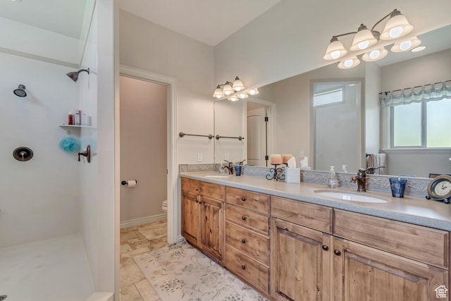 3028 W Viola Ln, Riverton, UT 84065 - full bathroom with double vanity, walk in shower, and toilet