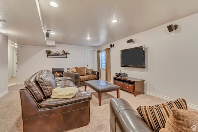 3028 W Viola Ln, Riverton, UT 84065 - living area with light colored carpet, baseboards, a warm lit fireplace, and recessed lighting