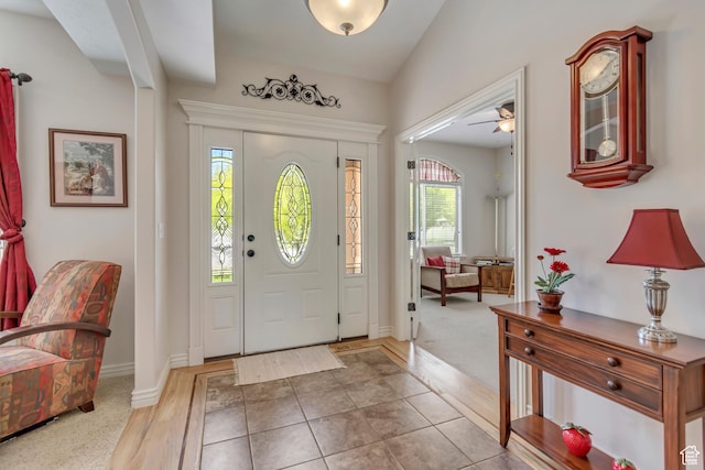 3028 W Viola Ln, Riverton, UT 84065 - foyer featuring ceiling fan, wood finished floors, and baseboards