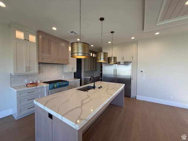 2921 E Yavin Way, St George, UT 84790 - kitchen with a sink, stainless steel appliances, baseboards, backsplash, and recessed lighting