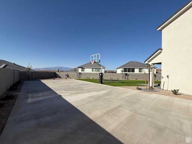 2921 E Yavin Way, St George, UT 84790 - view of patio / terrace featuring community basketball court and a mountain view