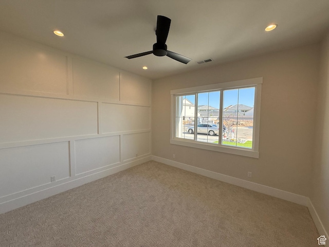 2921 E Yavin Way, St George, UT 84790 - spare room with ceiling fan, recessed lighting, light colored carpet, and baseboards