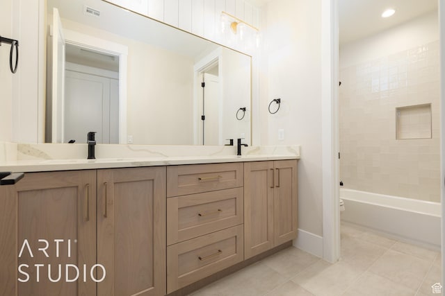 2921 E Yavin Way, St George, UT 84790 - full bath with double vanity, tile patterned flooring, baseboards, bathing tub / shower combination, and toilet