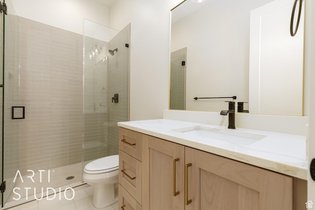 2921 E Yavin Way, St George, UT 84790 - full bathroom featuring toilet, vanity, a stall shower, and tile patterned floors