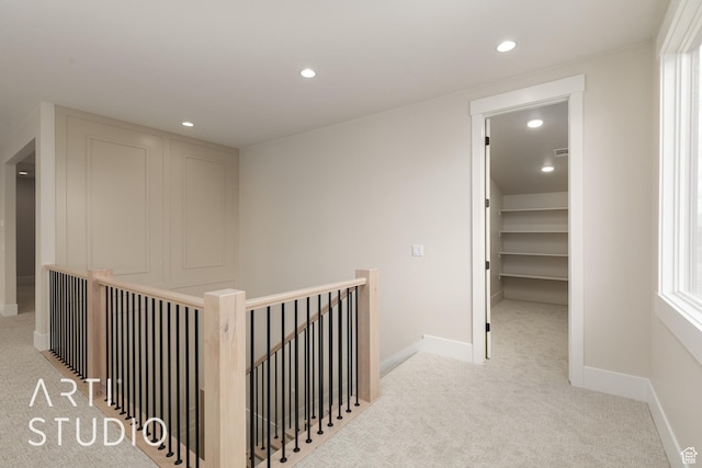2921 E Yavin Way, St George, UT 84790 - hall featuring an upstairs landing, light carpet, recessed lighting, and baseboards