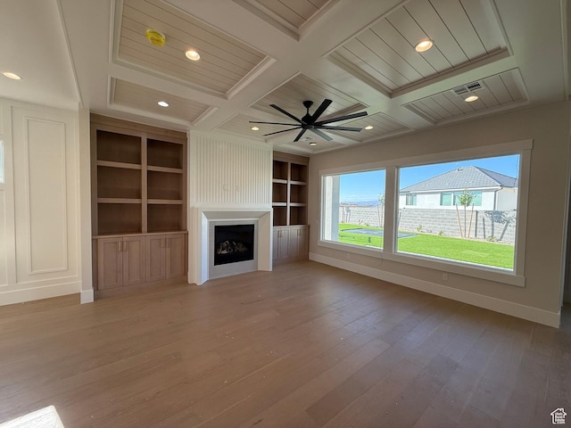 2921 E Yavin Way, St George, UT 84790 - unfurnished living room featuring light wood finished floors, coffered ceiling, recessed lighting, baseboards, and a fireplace