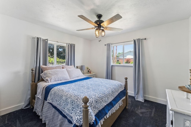 623 N 120 W, Lehi, UT 84043 - bedroom featuring dark carpet, multiple windows, and baseboards