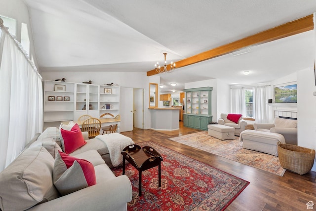 245 S 400 W, Heber City, UT 84032 - living room with lofted ceiling, wood finished floors, a chandelier, and a fireplace