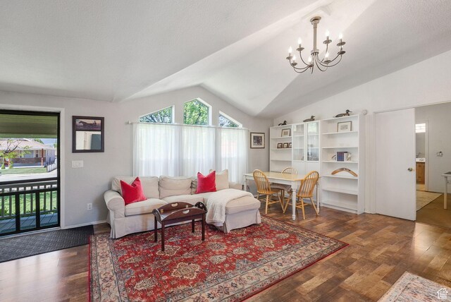 245 S 400 W, Heber City, UT 84032 - living room featuring lofted ceiling, a chandelier, and wood finished floors