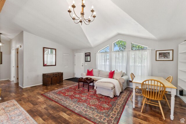 245 S 400 W, Heber City, UT 84032 - living room featuring vaulted ceiling, a chandelier, wood finished floors, and baseboards