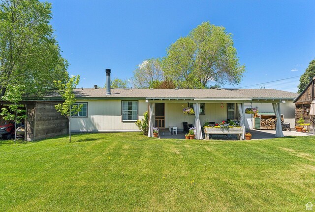 245 S 400 W, Heber City, UT 84032 - back of property with a patio and a yard