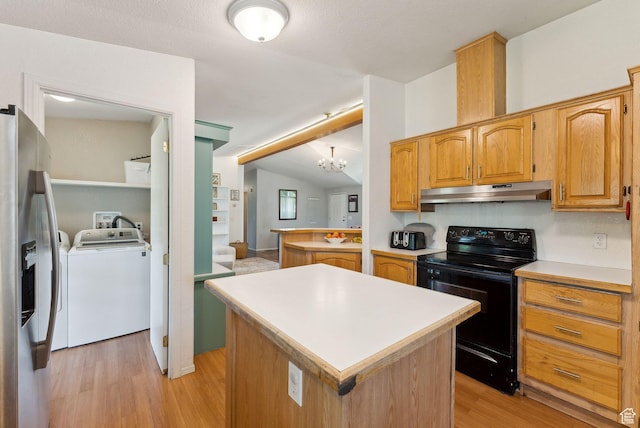 245 S 400 W, Heber City, UT 84032 - kitchen with black range with electric stovetop, under cabinet range hood, washer and clothes dryer, stainless steel fridge with ice dispenser, and light wood finished floors