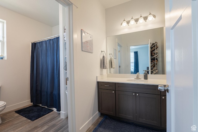 1994 N 3330 W Unit A304, Lehi, UT 84043 - full bathroom with toilet, wood finished floors, baseboards, vanity, and a shower with shower curtain