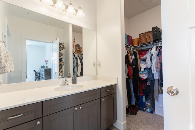 1994 N 3330 W Unit A304, Lehi, UT 84043 - bathroom with vanity and a walk in closet
