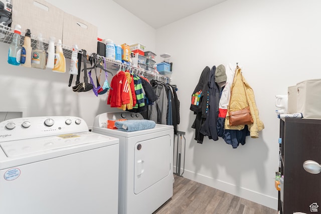1994 N 3330 W Unit A304, Lehi, UT 84043 - laundry area with separate washer and dryer, wood finished floors, and baseboards