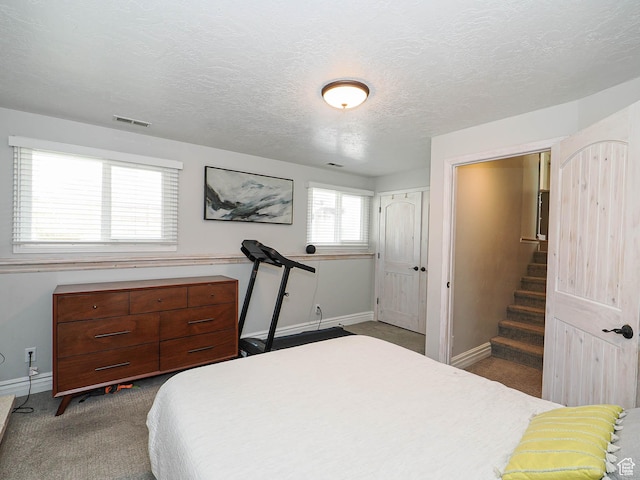 8701 S 1365 W, West Jordan, UT 84088 - bedroom with carpet flooring, baseboards, and a textured ceiling