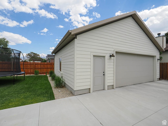 8701 S 1365 W, West Jordan, UT 84088 - detached garage featuring a trampoline