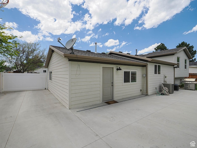 8701 S 1365 W, West Jordan, UT 84088 - rear view of property featuring a patio area and central air condition unit