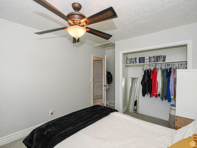 8701 S 1365 W, West Jordan, UT 84088 - bedroom with carpet, a closet, baseboards, a ceiling fan, and a textured ceiling