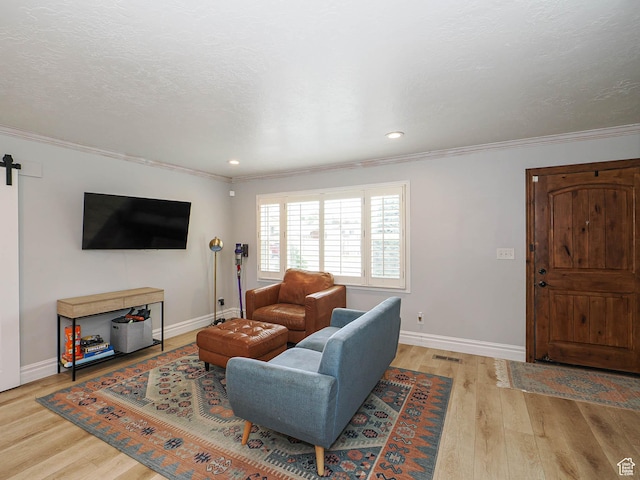 8701 S 1365 W, West Jordan, UT 84088 - living area featuring crown molding, wood finished floors, baseboards, and recessed lighting
