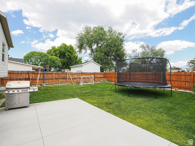 8701 S 1365 W, West Jordan, UT 84088 - view of yard with a trampoline and a patio