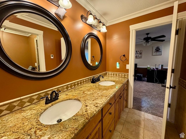 1710 N 2625 E, Layton, UT 84040 - full bath featuring tile patterned floors, double vanity, a ceiling fan, and ornamental molding
