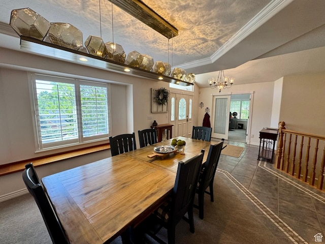 1710 N 2625 E, Layton, UT 84040 - dining space featuring a chandelier, a tray ceiling, baseboards, tile patterned floors, and crown molding