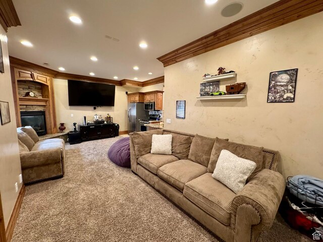 1710 N 2625 E, Layton, UT 84040 - carpeted living room featuring ornamental molding, recessed lighting, and a large fireplace