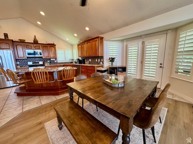1710 N 2625 E, Layton, UT 84040 - dining space featuring lofted ceiling, recessed lighting, and light wood-style flooring