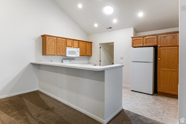 544 W 300 S Unit C, Springville, UT 84663 - kitchen with white appliances, light countertops, a peninsula, baseboards, and high vaulted ceiling