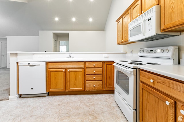 544 W 300 S Unit C, Springville, UT 84663 - kitchen featuring white appliances, a peninsula, a sink, light countertops, and brown cabinetry