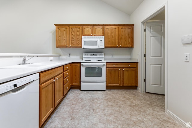 544 W 300 S Unit C, Springville, UT 84663 - kitchen featuring white appliances, a sink, light countertops, lofted ceiling, and brown cabinetry