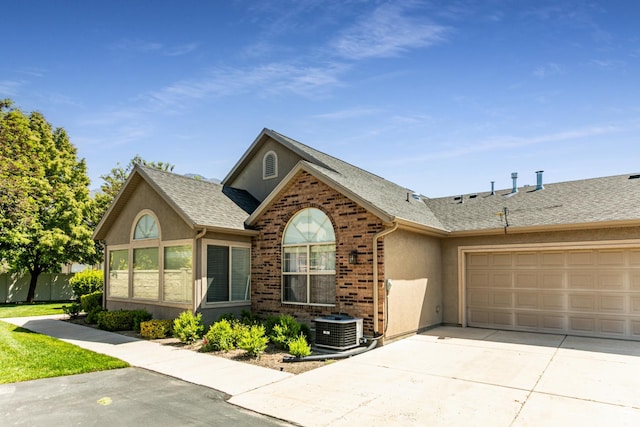 544 W 300 S Unit C, Springville, UT 84663 - single story home featuring stucco siding, driveway, a garage, central AC, and roof with shingles