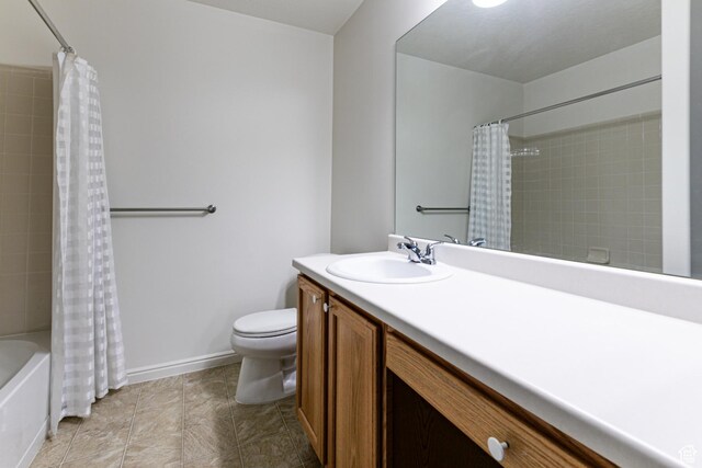 544 W 300 S Unit C, Springville, UT 84663 - bathroom featuring toilet, vanity, shower / bath combo with shower curtain, and baseboards