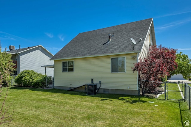 4733 S 3900 W, Roy, UT 84067 - rear view of property with a shingled roof, cooling unit, and a gate