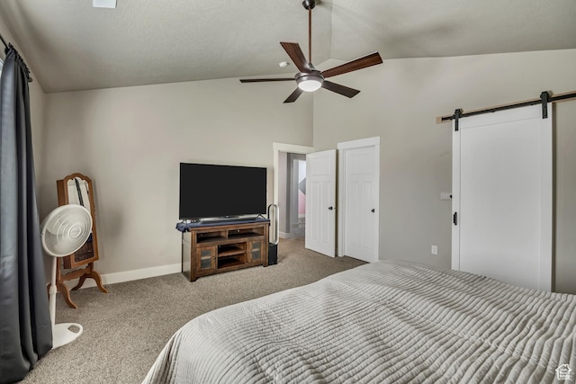12884 S Tortoise Ln, Riverton, UT 84096 - bedroom with carpet floors, a barn door, baseboards, ceiling fan, and high vaulted ceiling