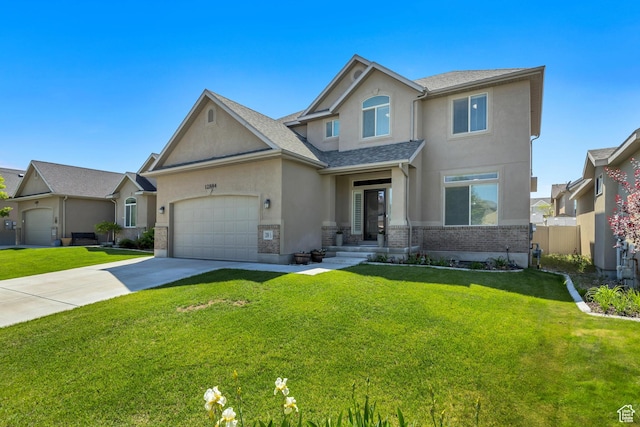 12884 S Tortoise Ln, Riverton, UT 84096 - view of front of home featuring stucco siding, concrete driveway, and a garage