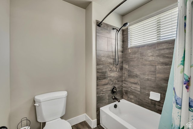 12884 S Tortoise Ln, Riverton, UT 84096 - bathroom featuring shower / bath combination with curtain, toilet, baseboards, and wood finished floors