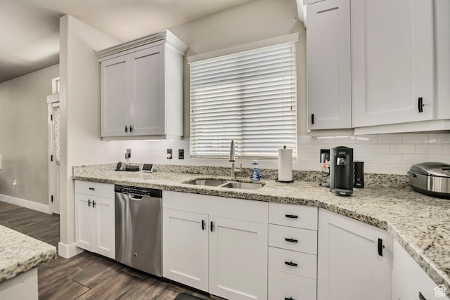 12884 S Tortoise Ln, Riverton, UT 84096 - kitchen with dishwasher, a sink, decorative backsplash, dark wood-style flooring, and white cabinets