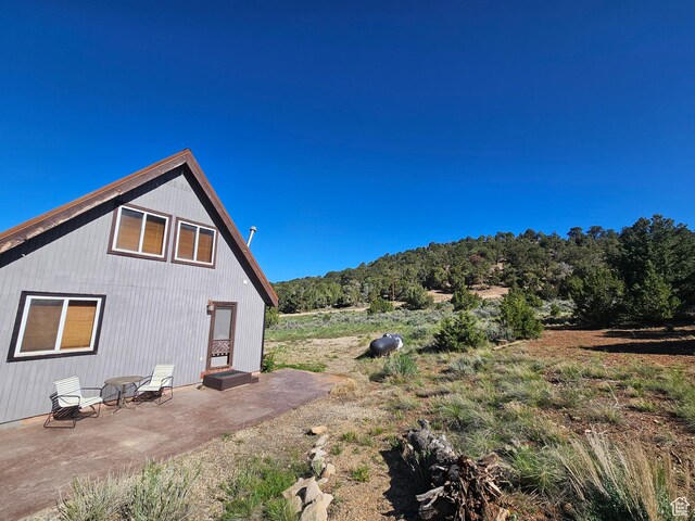 45465 W Airport Rd, Fruitland, UT 84027 - view of property exterior featuring a patio area