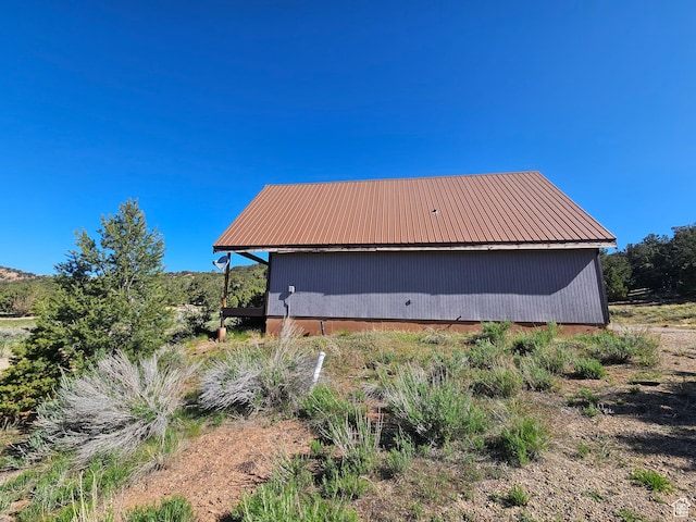 45465 W Airport Rd, Fruitland, UT 84027 - view of side of property featuring metal roof