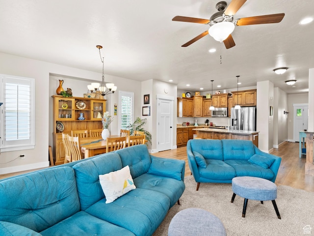 2143 W River Birch Rd, Mapleton, UT 84664 - living area with light wood-style flooring, a chandelier, baseboards, ceiling fan, and recessed lighting