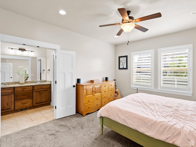 2143 W River Birch Rd, Mapleton, UT 84664 - bedroom with light colored carpet, ensuite bathroom, a sink, a ceiling fan, and recessed lighting