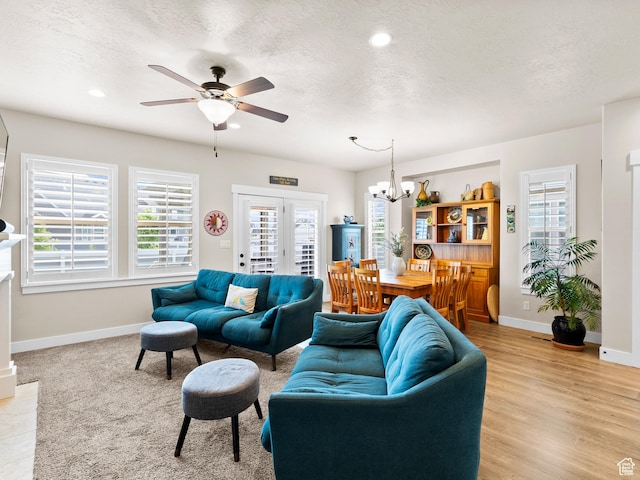 2143 W River Birch Rd, Mapleton, UT 84664 - living room featuring baseboards, a ceiling fan, a chandelier, a textured ceiling, and recessed lighting