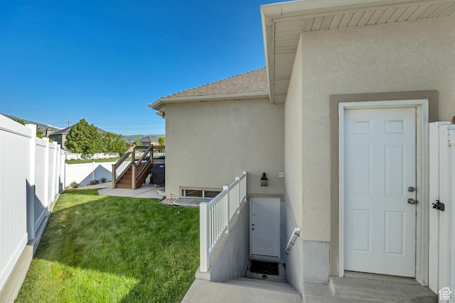 11743 S Silver Spur Ln, Draper, UT 84020 - property entrance with stucco siding and a shingled roof