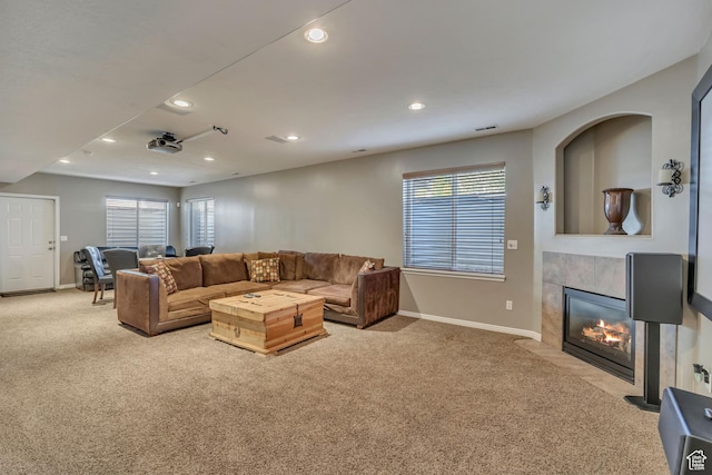 11743 S Silver Spur Ln, Draper, UT 84020 - carpeted living room featuring baseboards, a tile fireplace, and recessed lighting