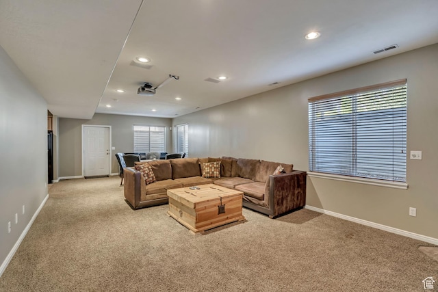 11743 S Silver Spur Ln, Draper, UT 84020 - living room featuring light carpet, baseboards, recessed lighting, and healthy amount of natural light