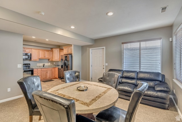11743 S Silver Spur Ln, Draper, UT 84020 - dining room with light carpet, baseboards, recessed lighting, and plenty of natural light